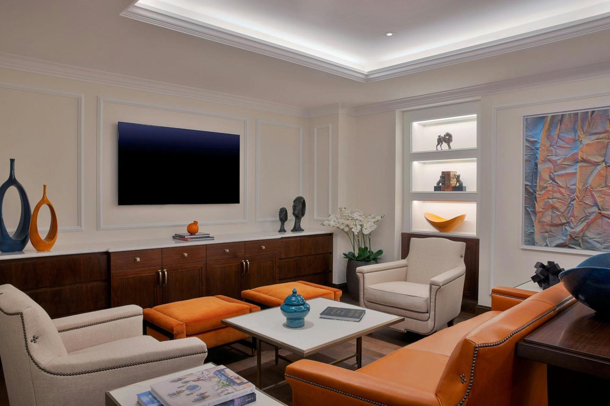 Hotel The Ritz-Carlton, Ammán Exteriér fotografie A living room with indirect lighting